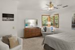 Queen size bed and seating area
